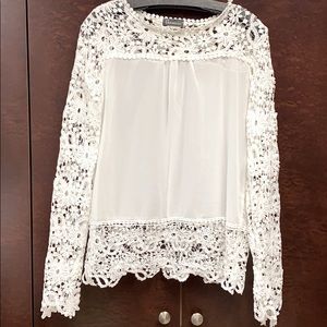 Feminine white top with lace details